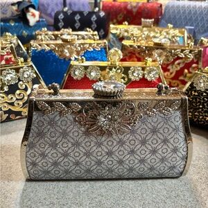 Luxurious Silver Clutch Bag with Floral Design with Crossbody chain strap